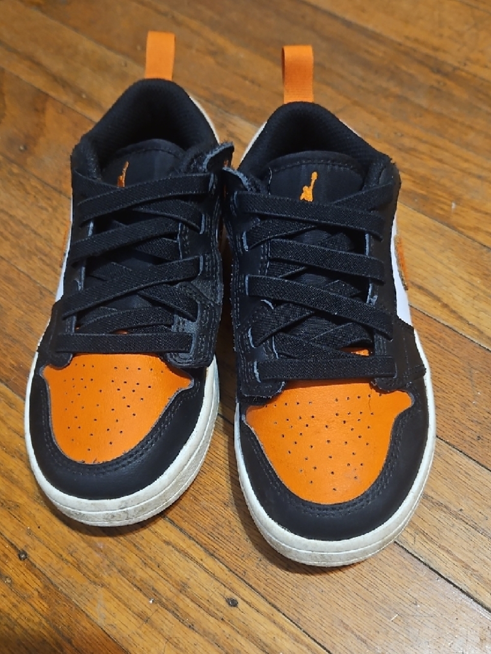 Kids Low-Top Jordans in Orange, Black & White - Picture 2 of 3